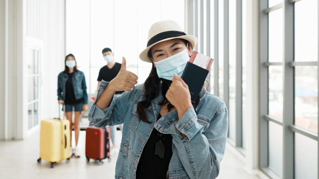 asian woman happy holding travel documents