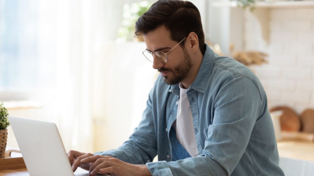 man using laptop