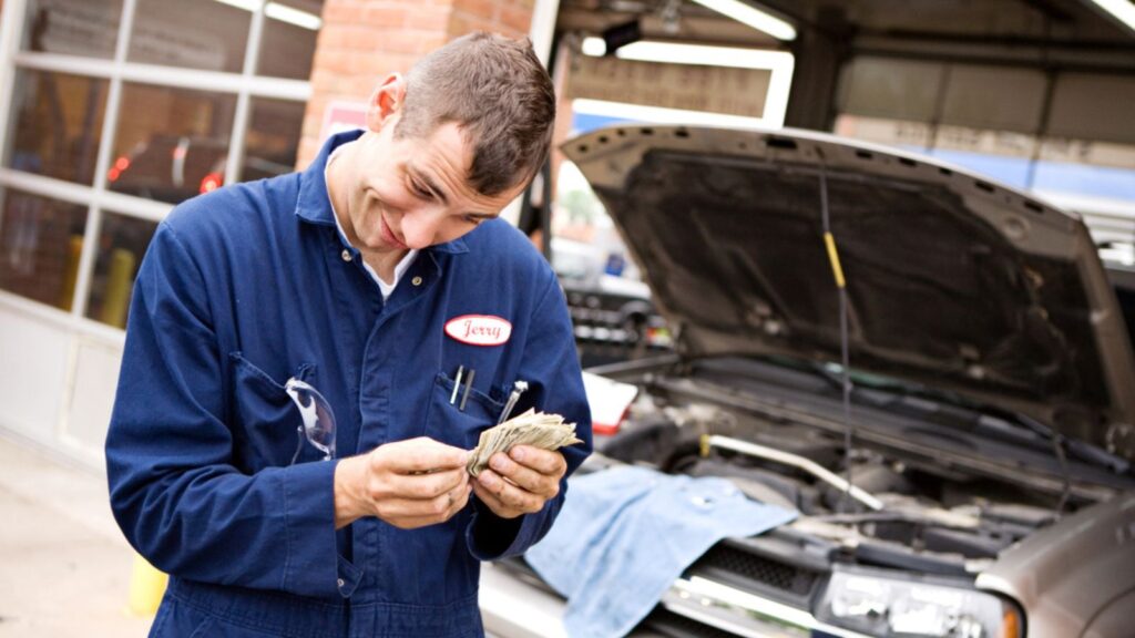Mechanic Counting money from repairs