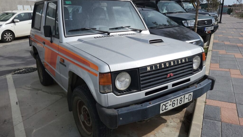 Old Mitsubishi Montero parked on the street
