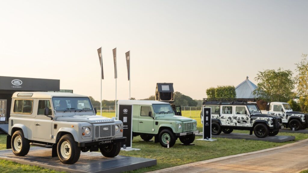 classic land rover defender vehicles on display