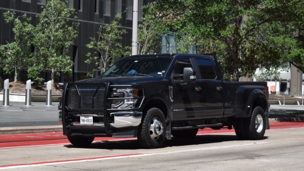 A Ford F-350 pick-up truck, cruising in the downtown financial district