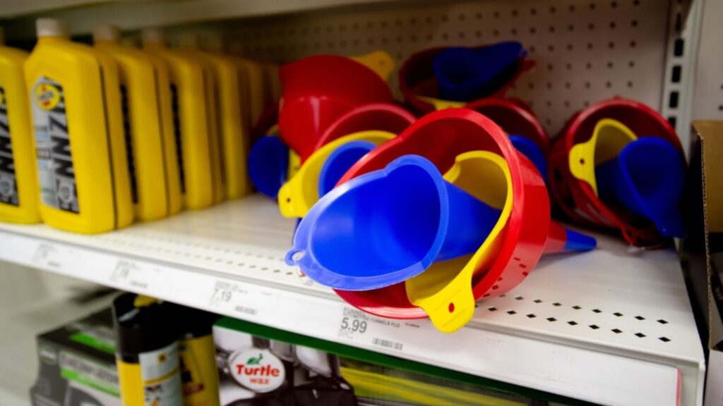 A view of several plastic oil funnels, on display at a local department store