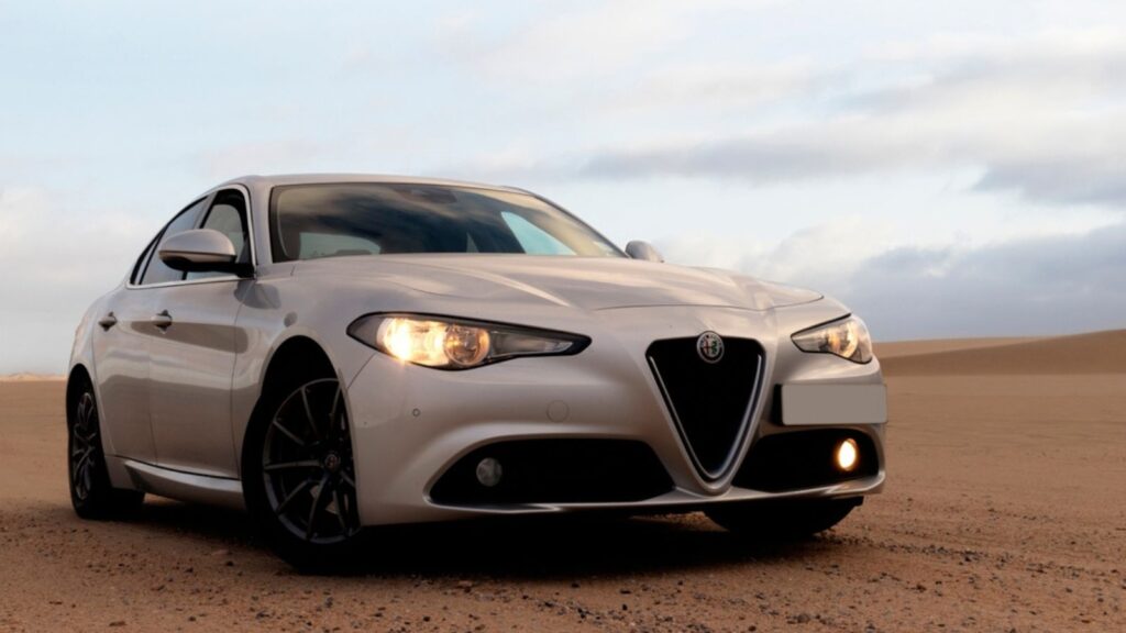 Alfa Romeo Giulia standing in the middle of the desert