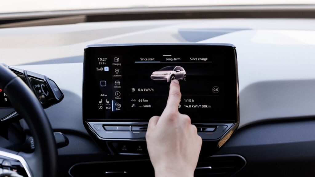 Male finger using an intelligent multimedia touchscreen system for modern electric automobiles