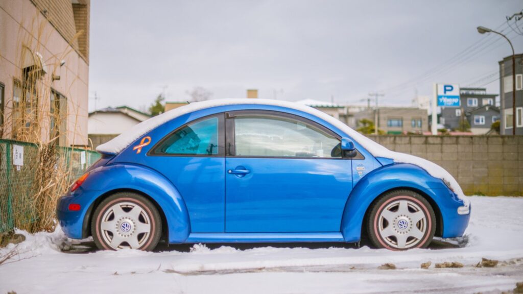 Volkswagen Beetle covered by snow