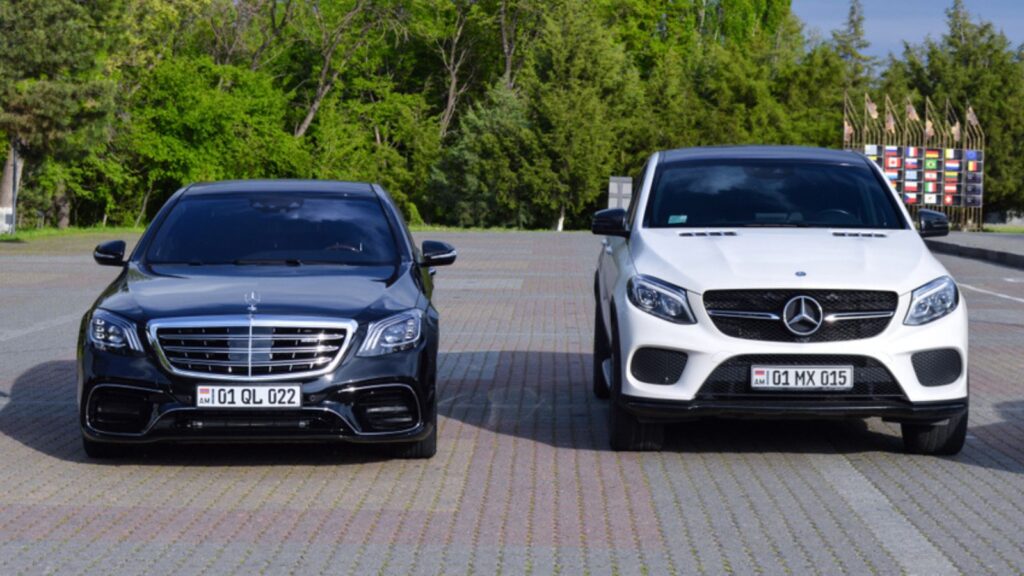 sedan Mercedes-Benz S-class and white crossover Mercedes-Benz GLE-class