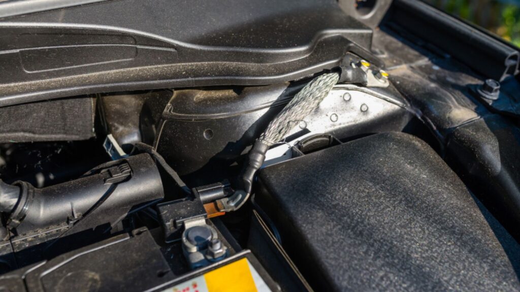 Ground cable connected to the cars body, minus cable