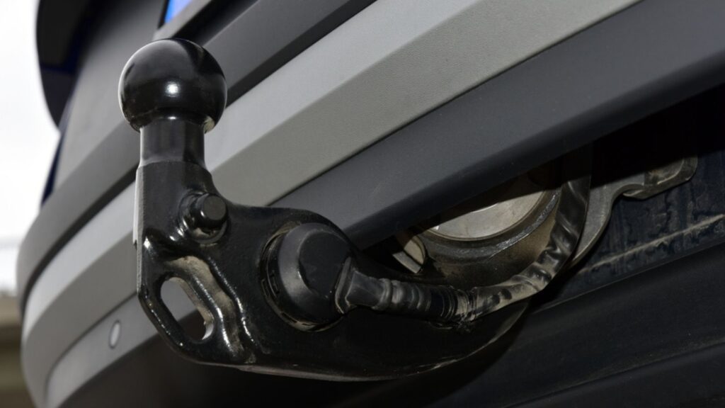 Trailer towing hitch on a passenger car