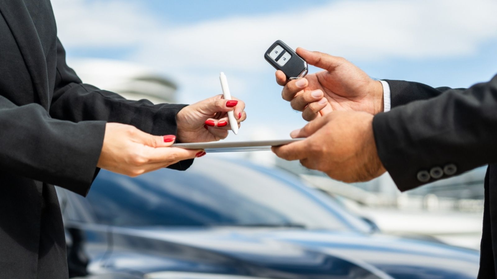 Young asian businesswoman buying new car with sale manager signing signature deal on tablet getting key and go to driving car